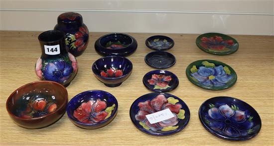 A collection of Moorcroft dishes and small vases